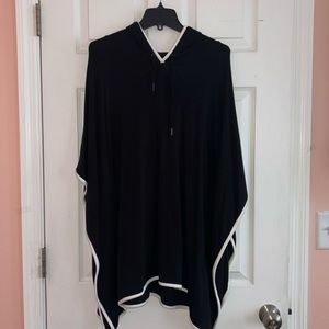 Chico’s black & white fleece poncho with hood. So soft and cozy. Size S/M NWOT